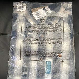 Carhartt short sleeve button down shirt. New in package